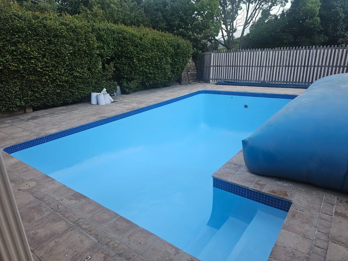 The same pool after a fresh marble plaster renovation